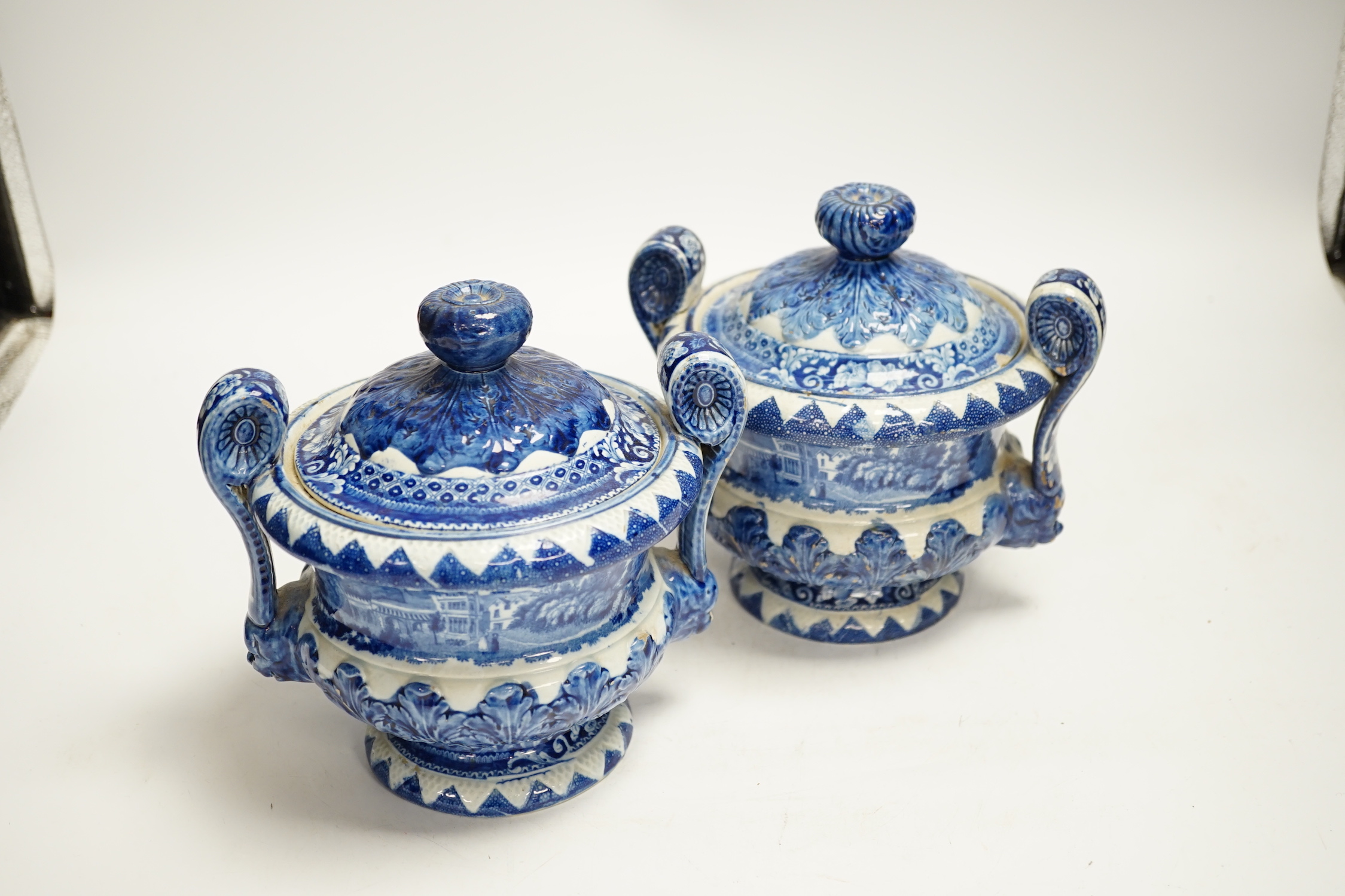 'Eatington Hall. Warwickshire' pattern - a pair of Riley blue and white pearlware sauce tureens and covers, 16cm